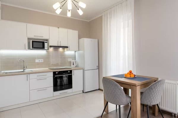 в новом доме на Оболони 15